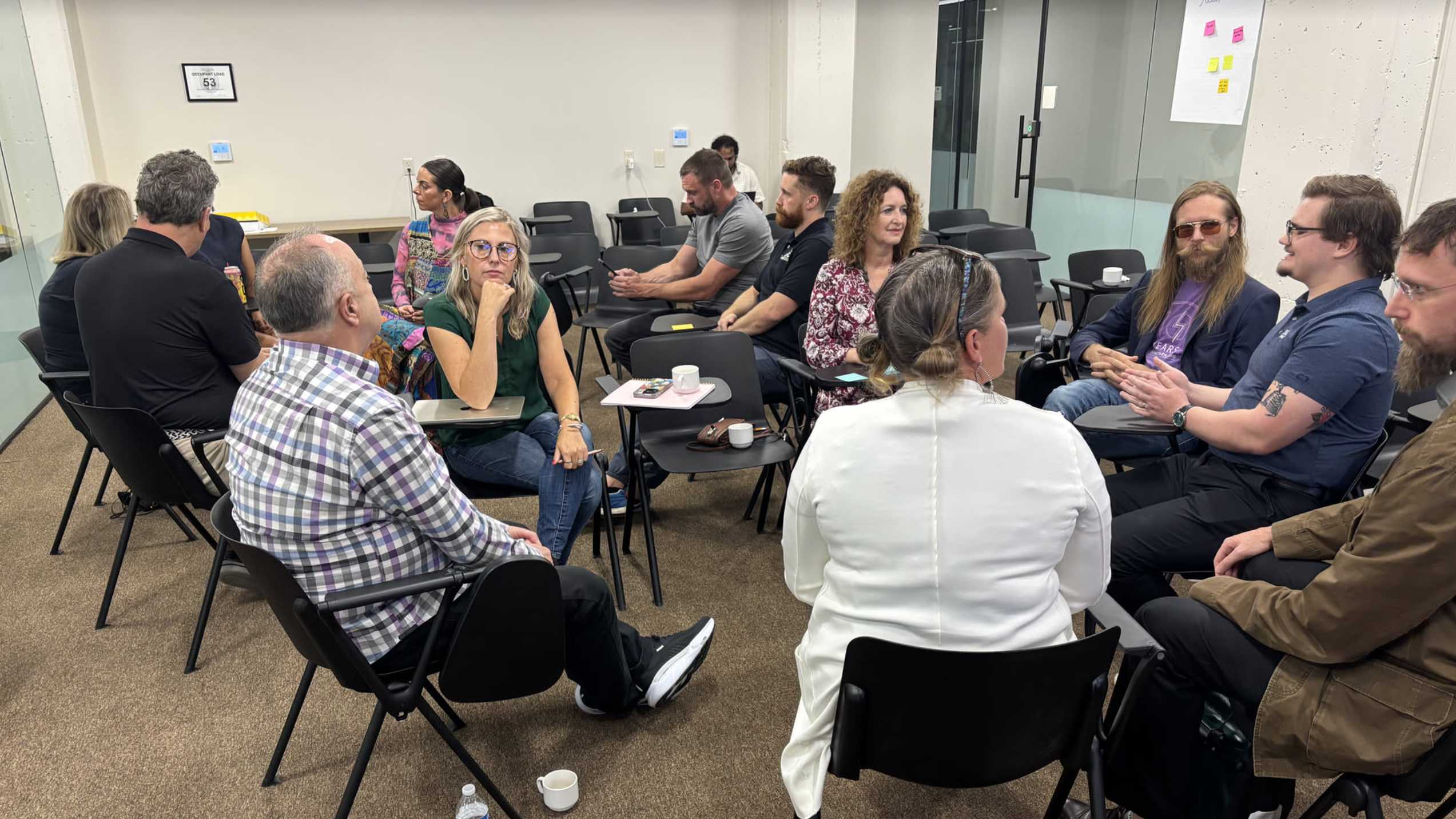 group of people chatting in a room